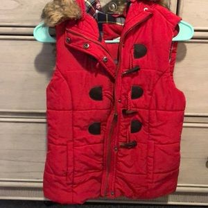 Red furry vest